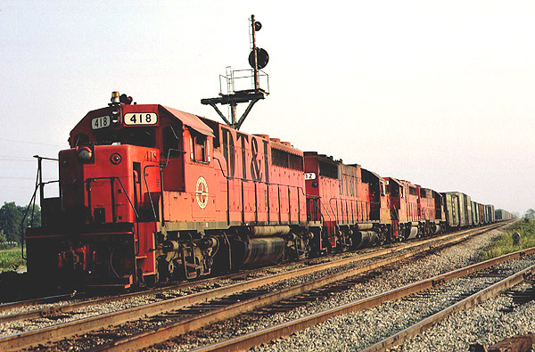 image copyright Jim Sinclair - do not use without permission - southbound DT&I train stopped at south end of Ottawa siding August 27, 1977